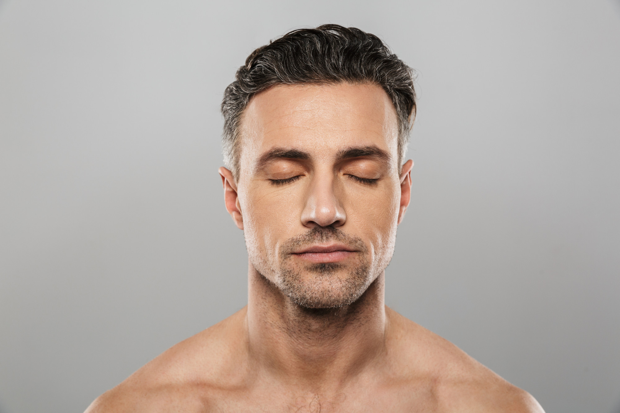 Man with perfect facial contours after Radiesse treatment.