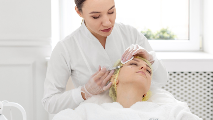 Female patient receiving Restylane treatment in a clinic.