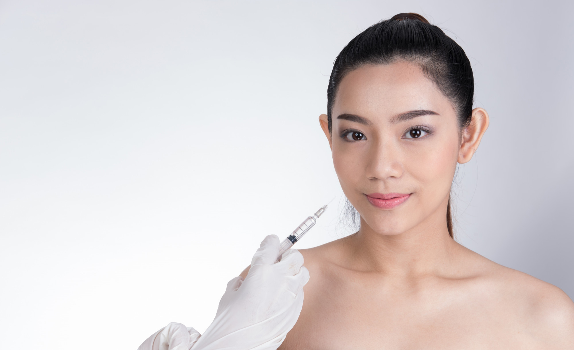 A woman receives Restylane to enhance her skin and overall appearance.